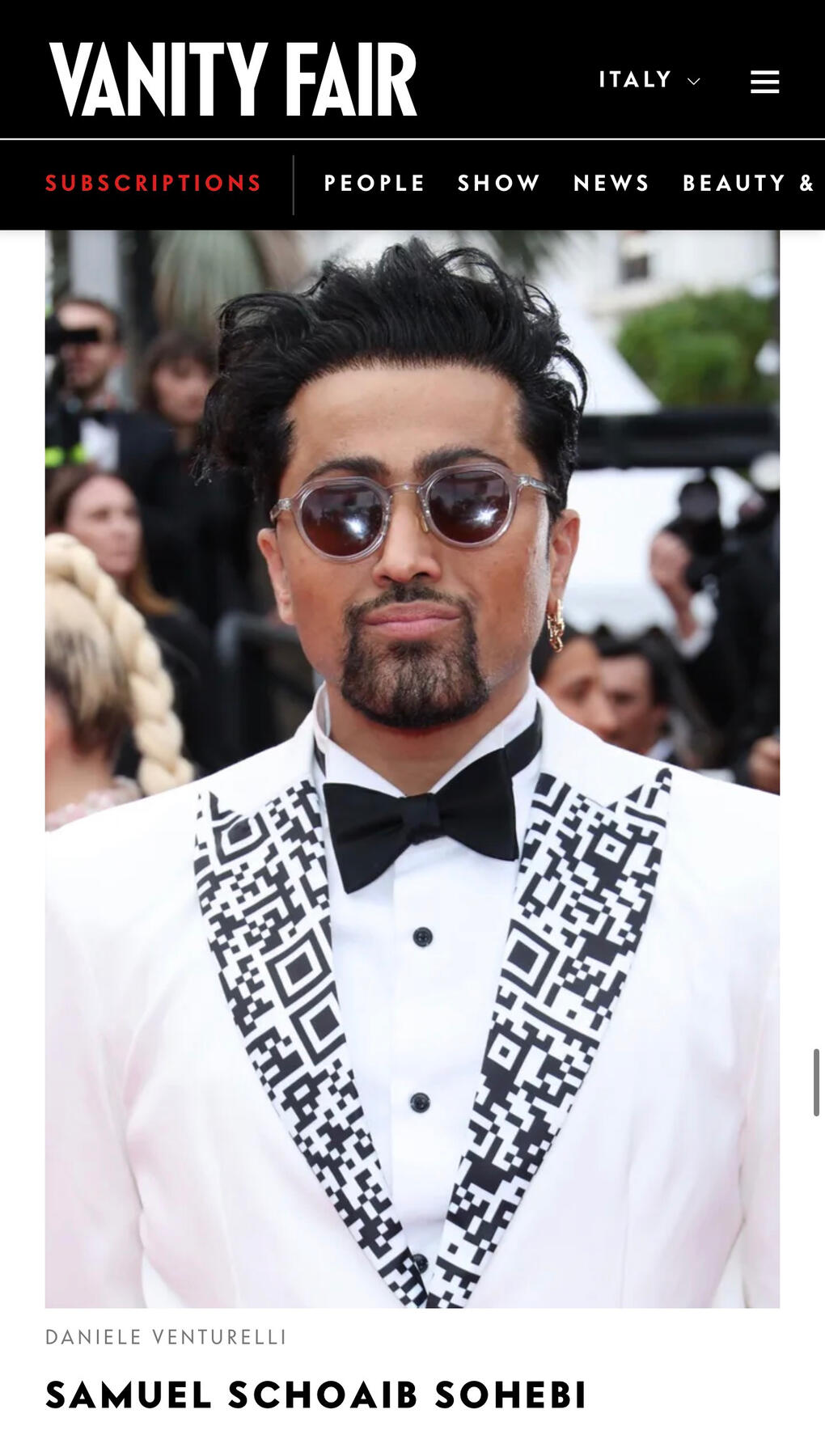 Samuel Sohebi on the red carpet at the Cannes Film Festival 2023, featured in Vanity Fair Italia, wearing a tailored Maison Novague suit on the red carpet.